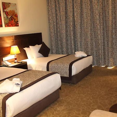 Tolip El Forsan Hotel Iszmáilija Kültér fotó A room at the hotel