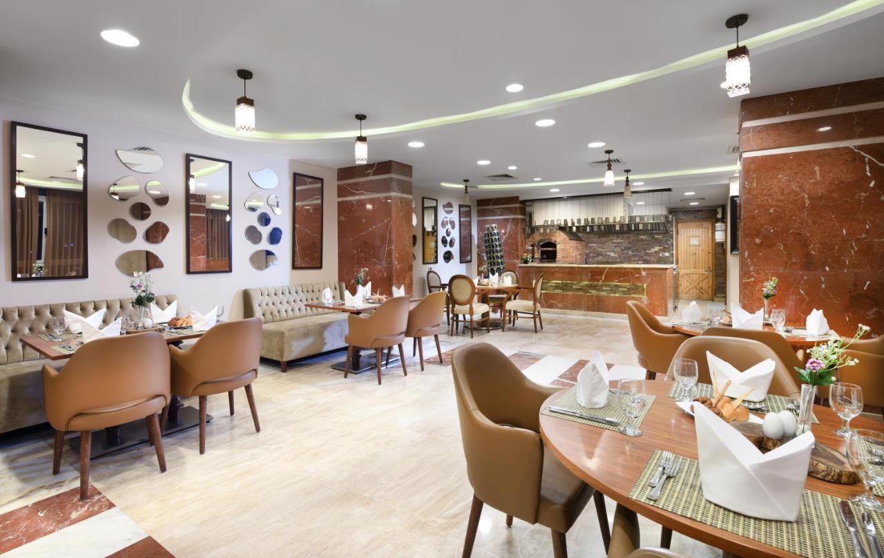Tolip El Forsan Hotel Iszmáilija Kültér fotó The restaurant