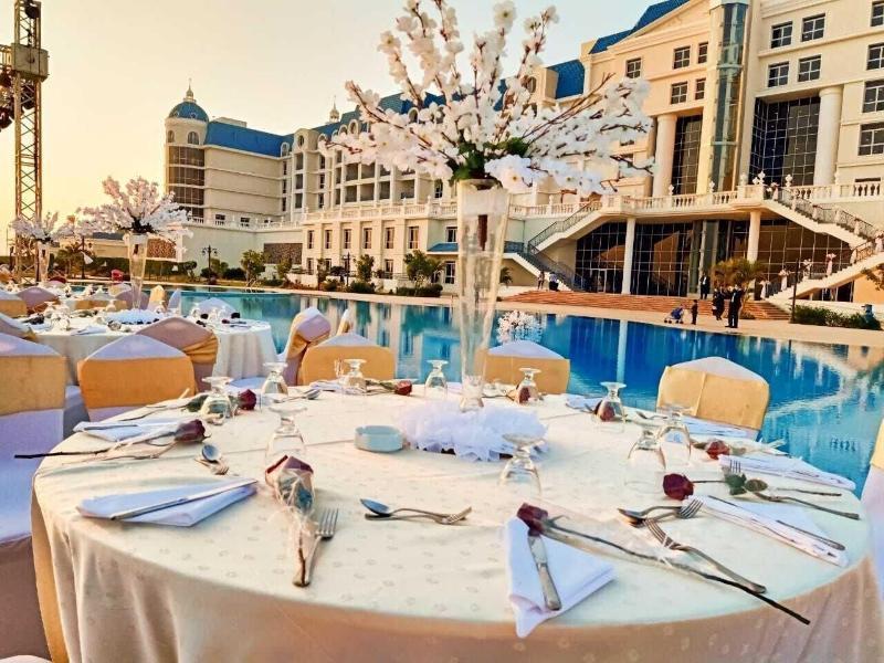Tolip El Forsan Hotel Iszmáilija Kültér fotó Wedding reception at the poolside